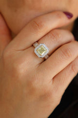 Elegant Diamond Engagement Rings 18K White & Yellow Gold Radiant Cut 2.00 Carats Fancy Yellow Diamond & 0.60 Carats Round & Baguette Diamond Halo Ring