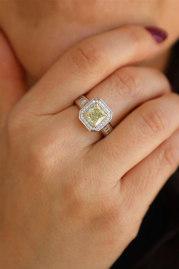 Elegant Diamond Engagement Rings 18K White & Yellow Gold Radiant Cut 2.00 Carats Fancy Yellow Diamond & 0.60 Carats Round & Baguette Diamond Halo Ring