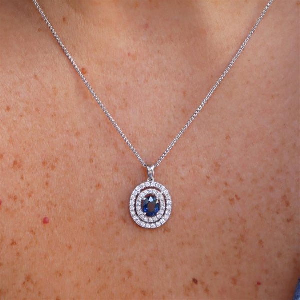 Vibrant 18K White Gold 0.34 Carats Sapphire & 0.45 Carats Diamonds Drop Pendant