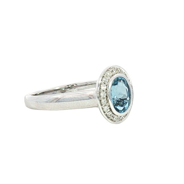 Bold & Elegant 18K White Gold  Oval Cut 0.74 Carats Aquamarine & 0.13 Carats Diamond Halo Ring