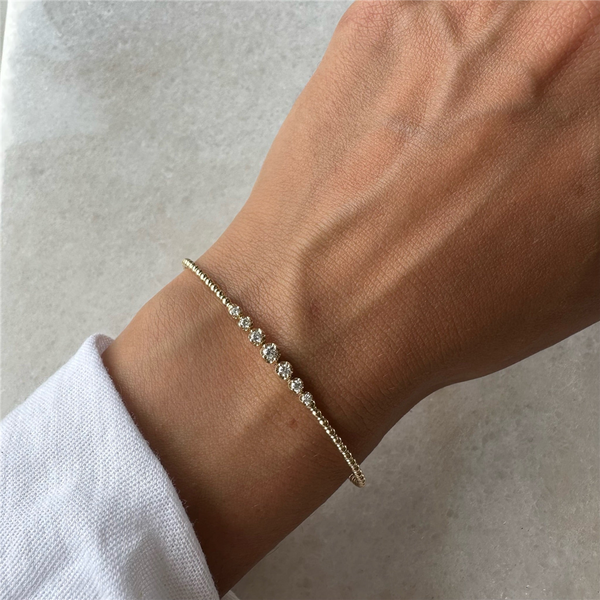Sophisticated & Timeless Diamond Bracelets 14K Gold Yellow & Titanium 0.23 Carats Graduated Diamond Flexible Bangle Bracelet - 0.23 CTW, Size 6.75 Inch