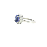 Bold & Elegant 18K White Gold Cushion Cut 3.26 CaratsTanzanite & 0.22 Carats Diamond Halo Ring