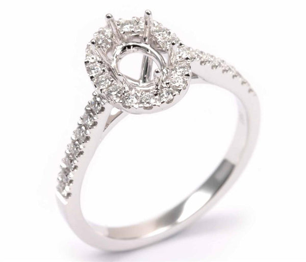 White 14 Karat Gold .45 Carats Oval Diamond Halo Engagement Ring