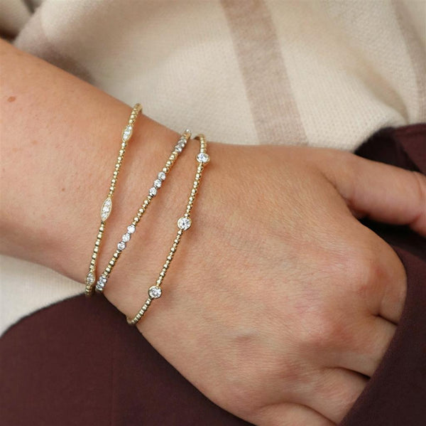 Sophisticated & Timeless Diamond Bracelets 14K Gold & Titanium Two-Toned Yellow & White Diamond Flexible Bangle Bracelet - 0.61 CTW, Size 6.5 Inch