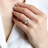 White 10 Karat Gold 0.30 Carats Synthetic Alexandrite & 0.05 Carats Diamond Halo Ring