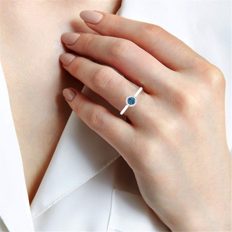 White 10 Karat Gold 0.30 Carats Synthetic Alexandrite & 0.05 Carats Diamond Halo Ring