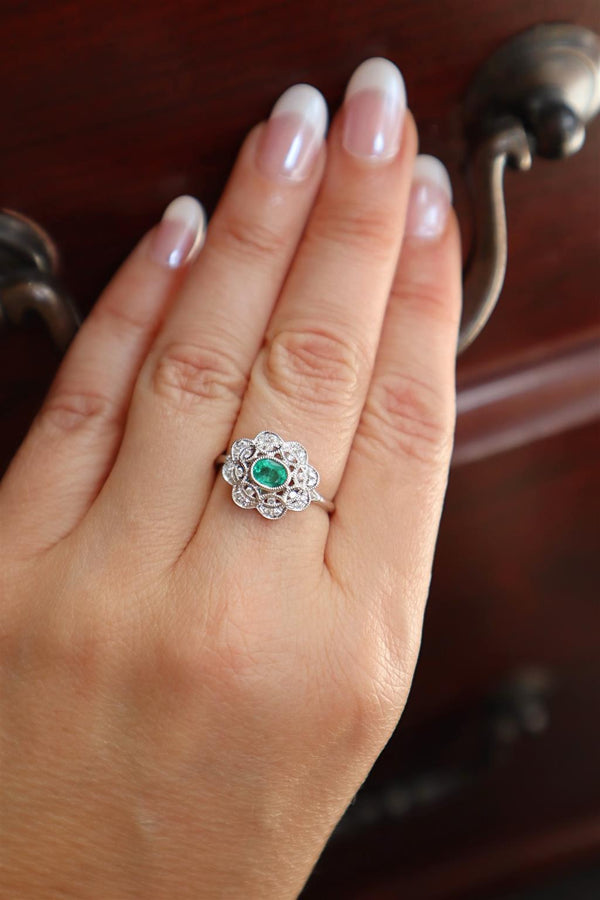Bold & Elegant 18K White Gold Oval Cut 0.43 Carat Emerald & 0.17 Carat Diamond Floral Vintage Inspired Halo Ring