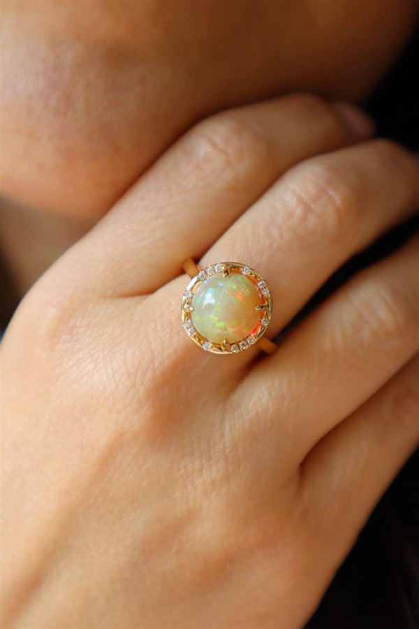 Bold & Elegant 18K Yellow Gold  Cabochon Cut 4.24 Carats Opal & 0.11 Carats Diamond Halo Ring