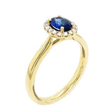Bold & Elegant 18K Yellow Gold Oval 0.63 Carats Blue Sapphire & 0.12 Carats Diamond Halo Ring
