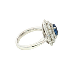 Bold & Elegant 18K White Gold Oval Cut 1.94 Carats Blue Sapphire & 1.26 Carats Baguette & Round Cut Diamond Triple Halo Ring