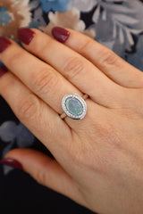 Bold & Elegant 18K White Gold Oval Cut 1.25 Opal & 0.13 Carats Diamond Halo Ring