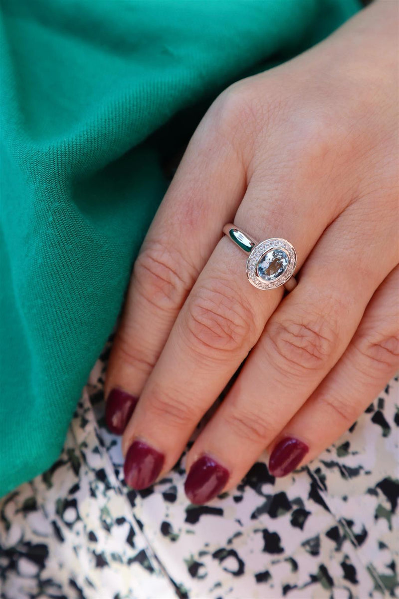 Bold & Elegant 18K White Gold  Oval Cut 0.74 Carats Aquamarine & 0.13 Carats Diamond Halo Ring