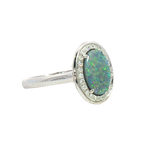 Bold & Elegant 18K White Gold Oval Cut 1.25 Opal & 0.13 Carats Diamond Halo Ring