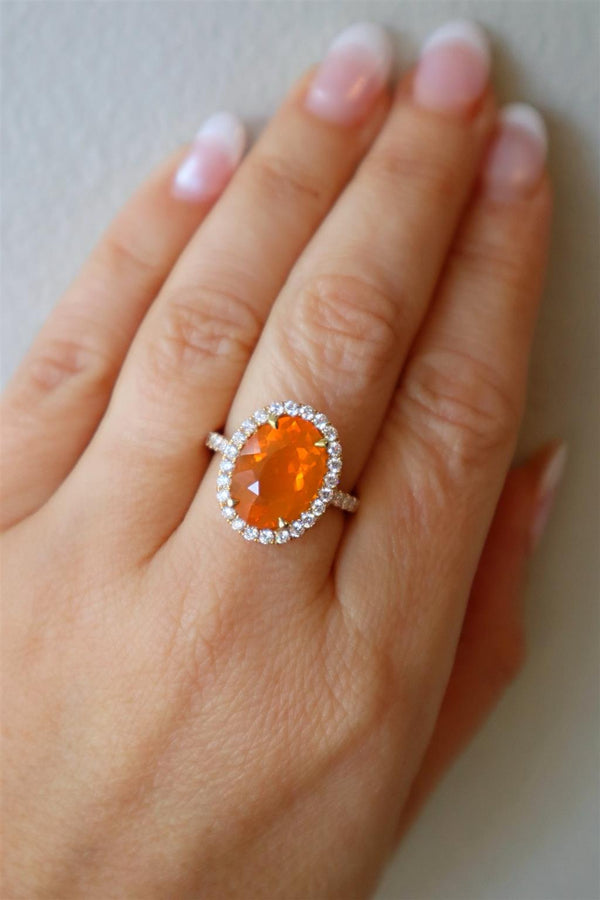 Elegant & Trendy 18K Yellow Gold 3.78 Carats Orange Fire Opal & 0.69 Carats Diamond Halo Ring