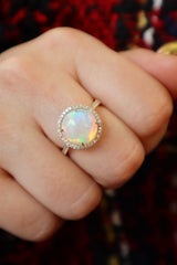 Bold & Elegant 14K Yellow Gold 2.05 Carats Opal & 0.24 Carats Diamond Halo Ring
