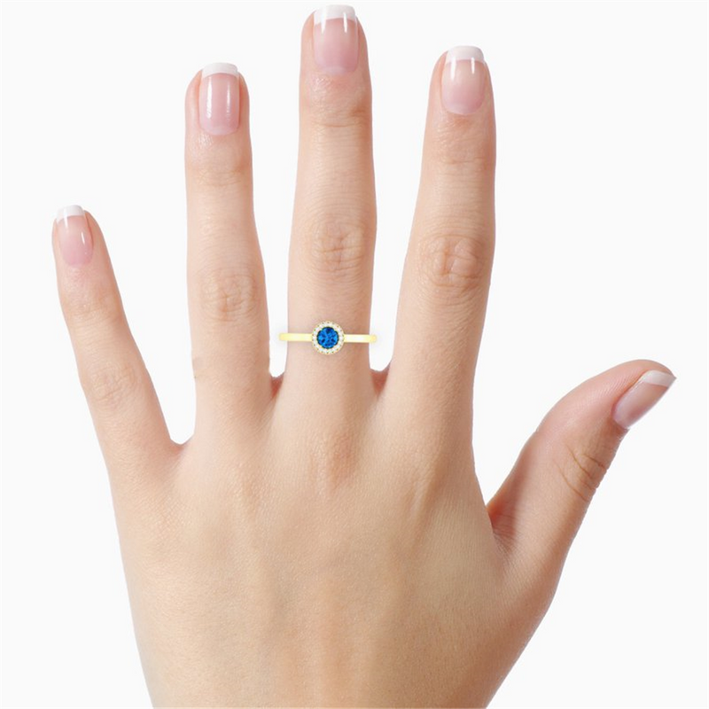 Yellow 10 Karat Gold 0.30 Carats Blue Topaz & 0.05 Carats Diamond Halo Ring